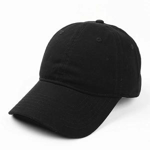 Close-up of black washed cotton baseball cap showing twill texture and stitching details