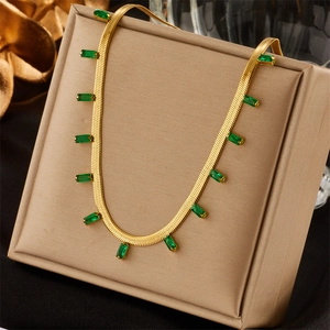 Elegant gold-tone snake chain necklace featuring inlaid green rectangular gemstones