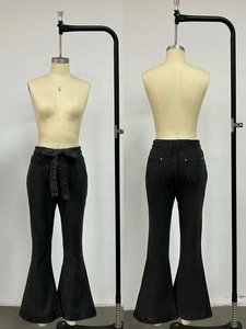 Front and back view of high-waisted black flared jeans with matching belt on mannequin