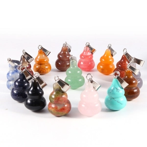 Detailed arrangement of varied natural stone gourd pendants with secure metal loops