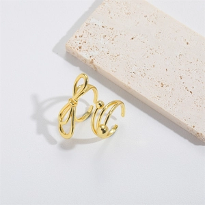 French vintage style gold knot design open adjustable ring with sleek metallic finish