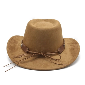 Close-up of suede cowboy hat with brown leather band and decorative metal buckle