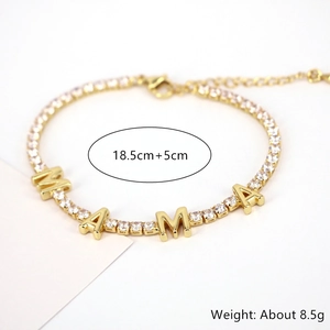 Detail of gold MAMA bracelet with white zircon inlay and 18.5cm+5cm size parameters