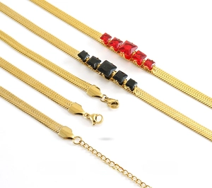 Detail of 18k gold plated stainless steel snake chains with red and black zircon stones