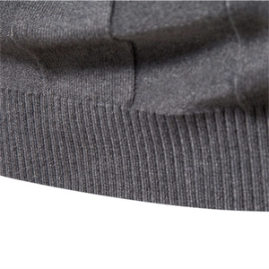 Men's dark gray turtleneck sweater featuring rib-knit hem and square textured weave