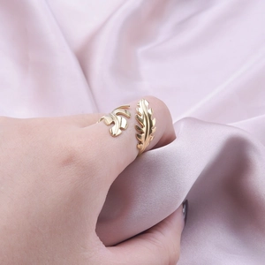 Adjustable 304 stainless steel open ring featuring a minimalist gold leaf branch design