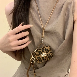 Faux fur leopard print mini bag pendant necklace with woven strap and gold buckle