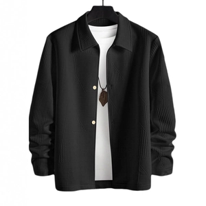 Men's black single-breasted jacket with textured geometric jacquard fabric and lapel