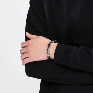 Men's braided black leather bracelet with industrial silver and black metal plate