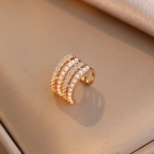 Elegant gold multi-layered C-shaped ear cuff featuring white pearls and zircon accents