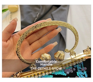Detail of sequin shell bag featuring golden ring handle and tulip-shaped metal clasps