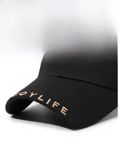 Detail of JOYLIFE letter embroidery on the brim of a black structured baseball cap
