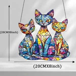 Three colorful 2D acrylic cat suncatchers with mosaic texture hanging on metal chains