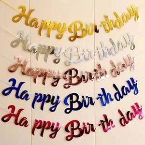 Detailed view of colorful metallic foil Happy Birthday banners in five assorted colors