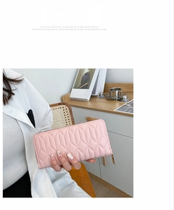 Pink quilted PU leather long wallet for women with secure gold zipper closure details