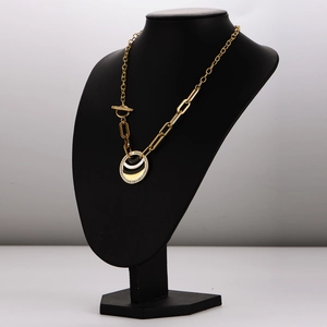 Gold paperclip chain necklace with a black and white striped pavé diamond pendant