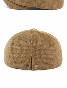 Close-up of brown newsboy cap back with metal adjustable snap buttons and wool texture