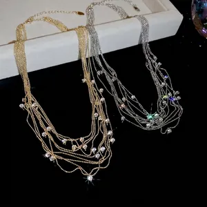 Elegant multi-layer tassel necklace with sparkling zircon accents in a gold and silver finish
