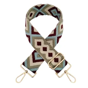 Detail of bohemian jacquard shoulder strap with wine red and blue green diamond pattern