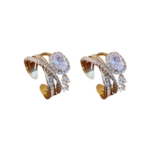 Luxurious layered gold ring with oval zircon center stone and sparkling pavé accents