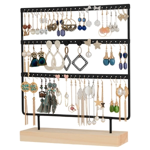 Three-tier black iron earring display stand with solid wood base for jewelry storage
