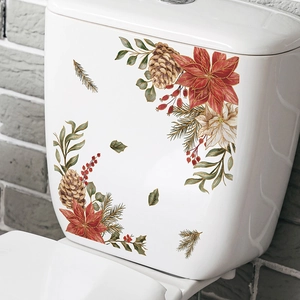 Autocollant de toilette de Noël avec poinsettia et pommes de pin sur céramique