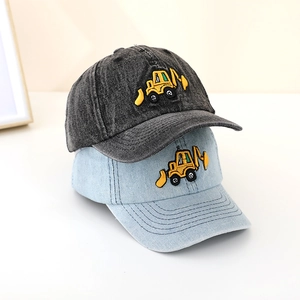 Detail of excavator embroidery on two-tone denim baseball caps for boys in blue and grey