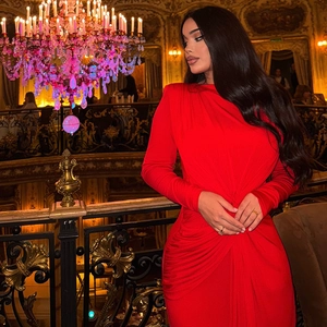 Elegant red long sleeve bodycon dress with ruched details for a slim-fit evening look