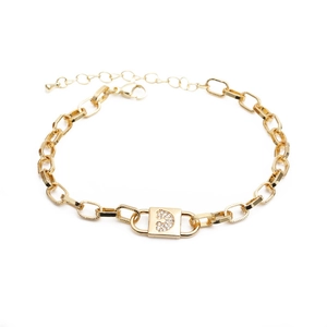 Gold chain bracelet with diamond-encrusted lock pendant and adjustable lobster clasp