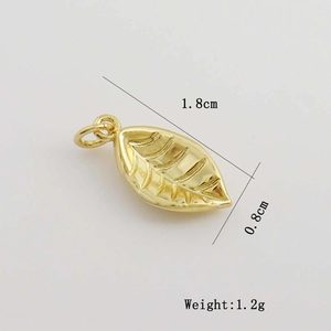Detailed view of leaf pendant dimensions 1.8x0.8cm weighing 1.2g in gold finish