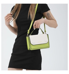 Contrast color patchwork crossbody bag with white flap and lemon green body on model