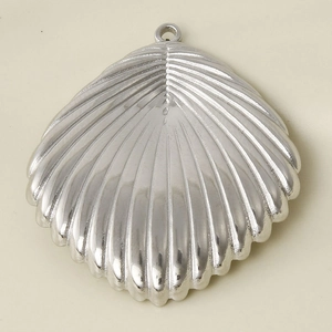 Detailed view of silver shell pendant with radial texture in 304 stainless steel