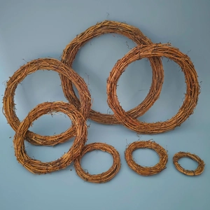 Set of seven natural grapevine wreaths in various sizes for DIY Christmas floral crafts