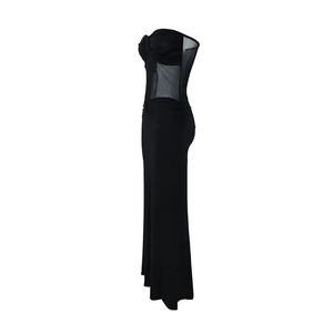 Side view of black tube dress featuring ruched chest and sheer mesh waist paneling
