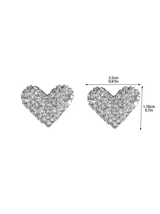 Detailed view of silver heart stud earrings with dimensions 2.2cm width and 1.78cm height