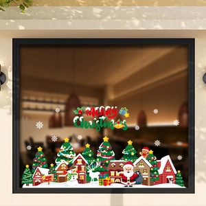 Christmas window decals with Santa, reindeer, and snow houses for festive glass decoration