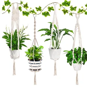 Set of 4 handmade macrame plant hangers with woven cotton rope and elegant fringe tassels