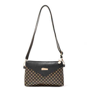 Brown and black patterned crossbody bag with geometric monogram design and metal clasp