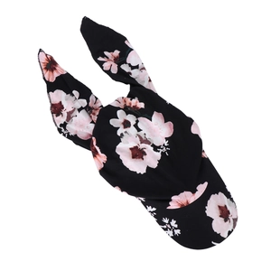 Detail of floral headwrap with bunny ear design and high-quality fabric texture