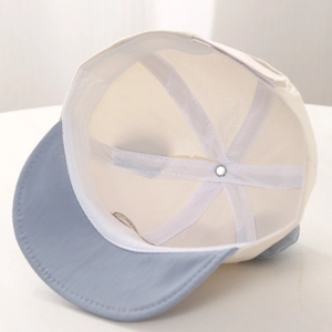 Detail of baby baseball cap interior showing reinforced seams and breathable fabric lining