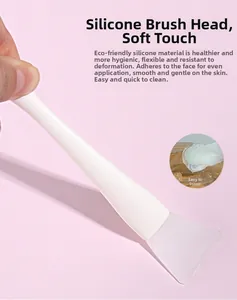 Detail view of the soft silicone face mask brush with white handle for smooth skin application