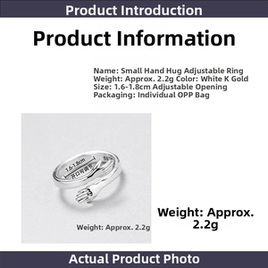 Detail showing Hugging Hands ring with S925 silver stamp and adjustable open band