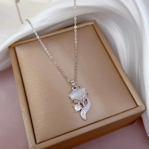 Silver fox necklace with opal pendant and diamonds in a premium beige jewelry gift box