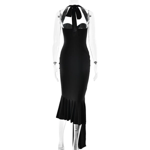 Rear view of black halter mermaid dress showing ruffled hemline and slim fit design