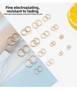 Macro detail of various sizes of gold plated jump rings for DIY jewelry making