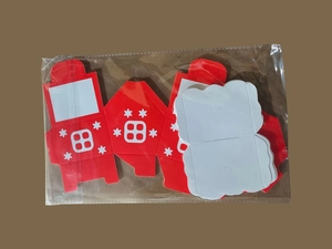 DIY Christmas candy box kit with red hollow star patterns and white corrugated paper liners