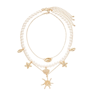 3-piece seaside set with layered faux pearls, starfish and shell pendants in gold finish