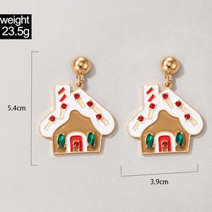 Detailed view of gingerbread house earrings with holiday dimensions 5.4cm by 3.9cm