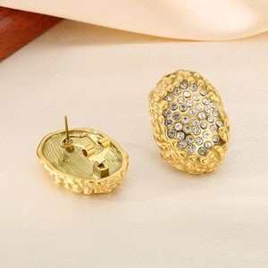 Oval gold plated stainless steel stud earrings with pave crystals and hammered texture