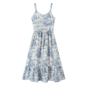 French vintage floral midi sundress with blue swallow print and ruffle hem on white background